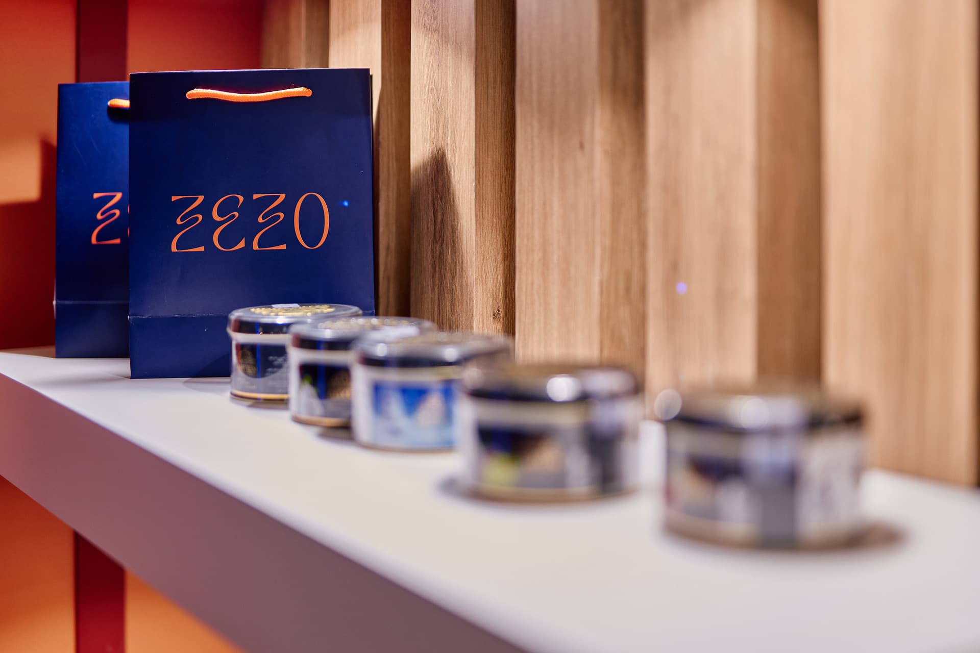 ZEZO branded bags and product jars on the display shelf