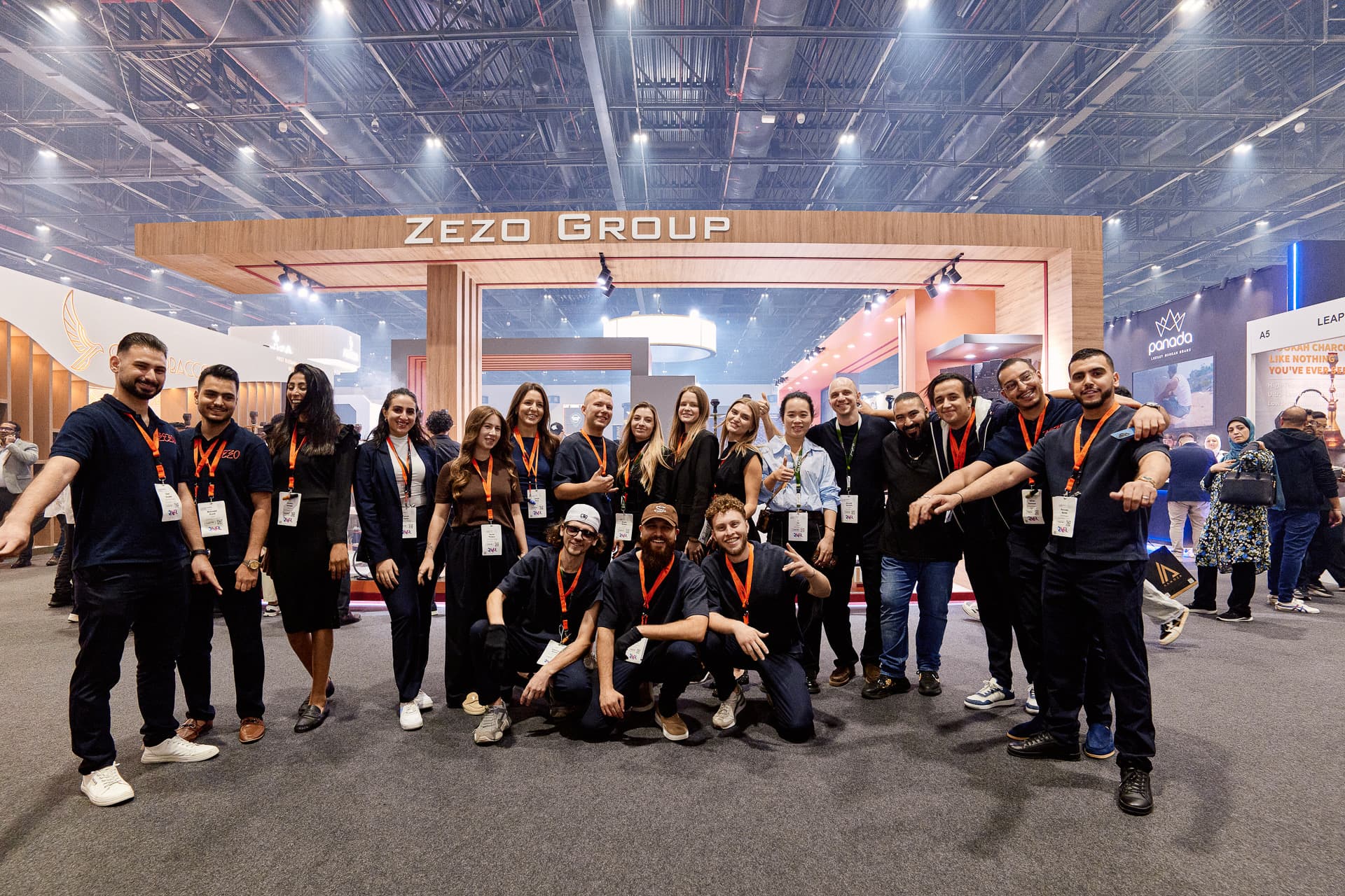 ZEZO team gathered in front of the exhibition stand